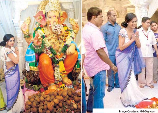 Poonam Pandey almost unrecognizable in sari at Ganpati puja