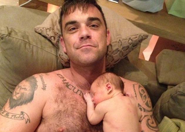 Robbie Williams posts picture of new baby daughter