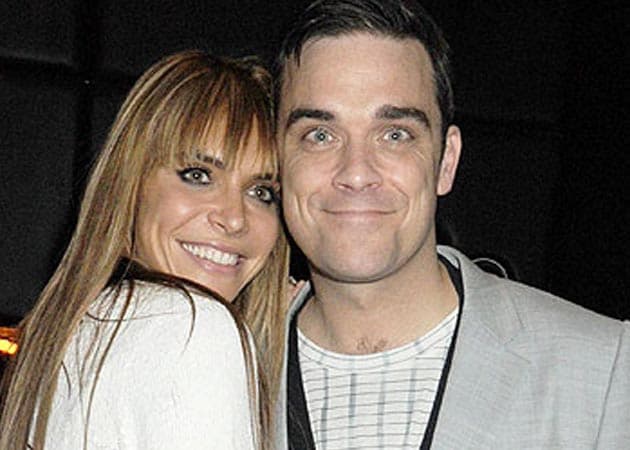 Robbie Williams experienced pregnancy symptoms with wife 