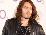 Russell Brand's love life is "the talk of his yoga class"
