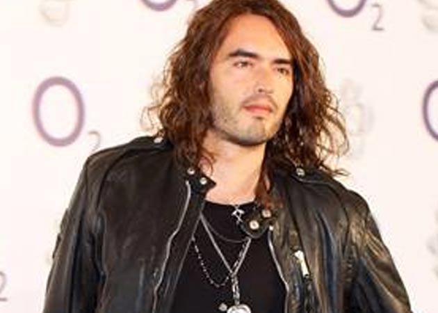 Russell Brand's love life is "the talk of his yoga class"