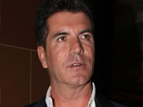 Simon Cowell hid in his closet when an intruder broke into his home