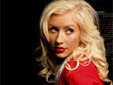 Christina Aguilera hopes her curvy figure will "empower" women