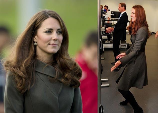 After photo scandal, Kate Middleton covers up for football