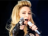 Fans walk out of Madonna concert after she brandishes fake gun
