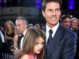 Tom Cruise sues magazine that said he abandoned Suri