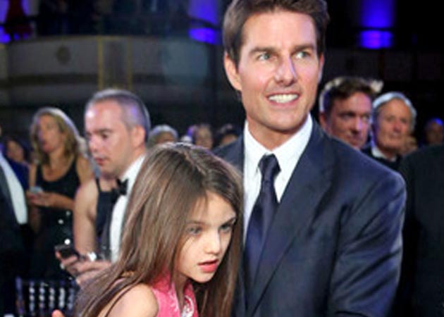 Tom Cruise sues magazine that said he abandoned Suri