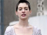 Anne Hathaway's short hair makes her look like her "gay brother"