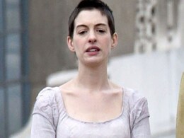 Anne Hathaway's short hair makes her look like her "gay brother" Anne Hathaway's short hair makes her look like her "gay brother"