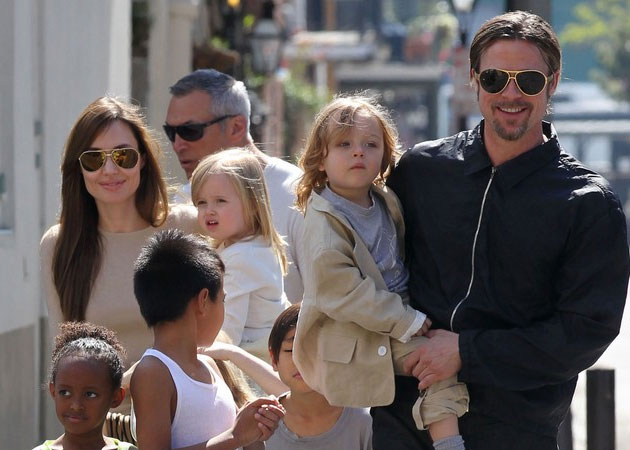 Brad Pitt lets his kids have food fights in restaurants