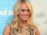 Carrie Underwood feels too young to have kids