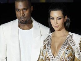 Kanye West, Kim Kardashian visit his mother's grave Kanye West, Kim Kardashian visit his mother's grave