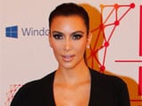 Kim Kardashian feels "handcuffed" to Kris Humphries