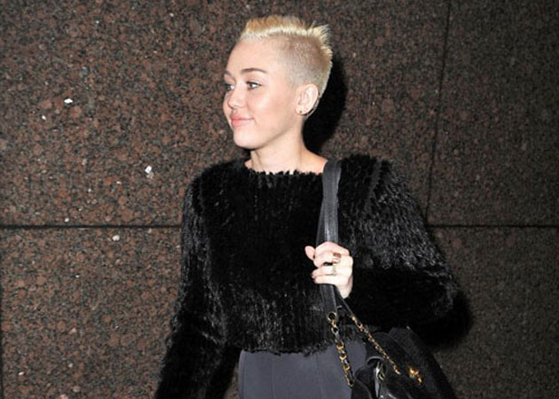 Miley Cyrus shaves head
