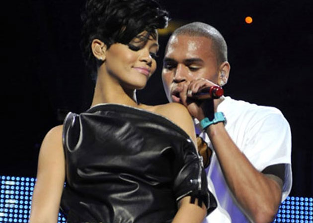 Rihanna posts topless picture of Chris Brown on Twitter