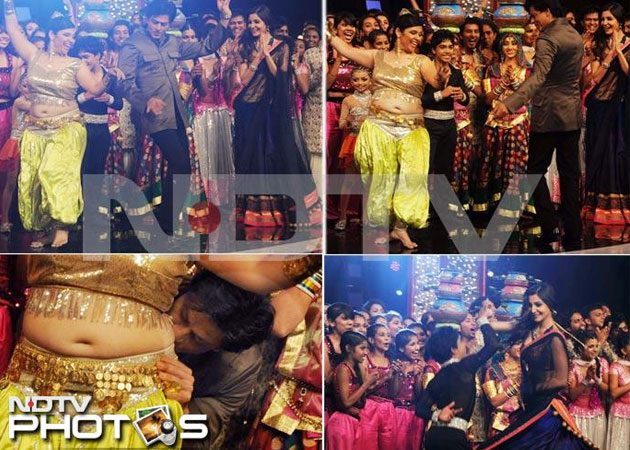 Shah Rukh Khan kisses belly-dancer on <i>India's Got Talent</i>