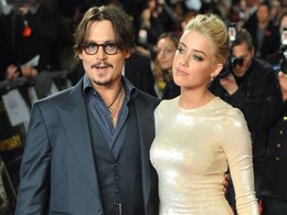 Johnny Depp names private beach after girlfriend Amber Heard Johnny Depp names private beach after girlfriend Amber Heard