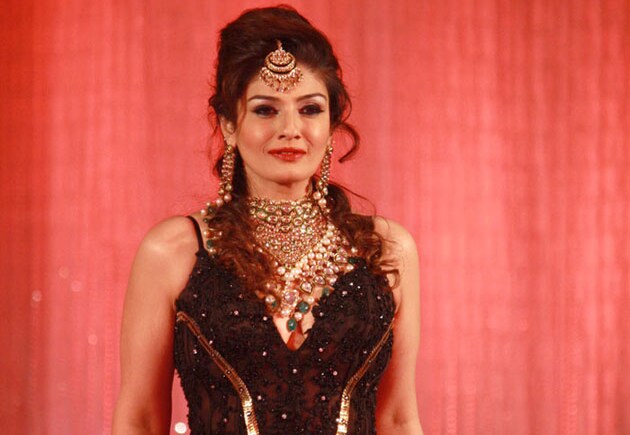 Raveena Tandon gets taste of potholed roads of Madhya Pradesh Raveena Tandon gets taste of potholed roads of Madhya Pradesh