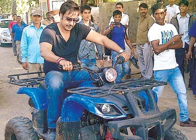 Ajay Devgn rides a beach buggy