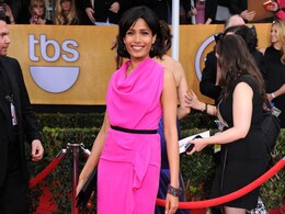 Freida Pinto breaks monotone at SAG awards with bright pink gown Freida Pinto breaks monotone at SAG awards with bright pink gown