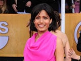 Freida Pinto breaks monotone at SAG awards with bright pink gown