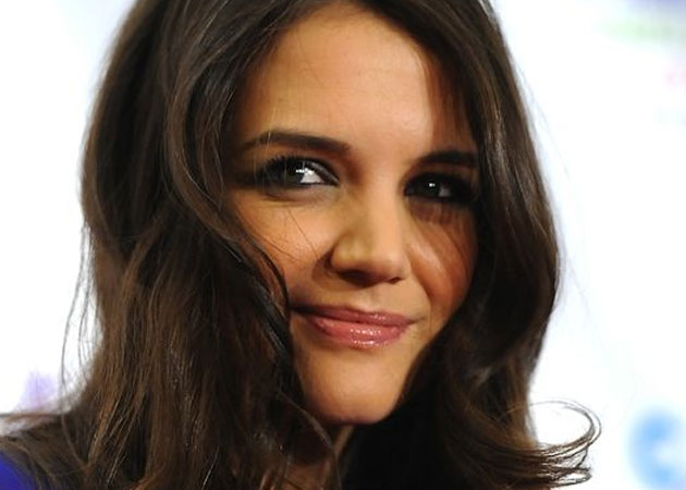 Katie Holmes hires a dating coach