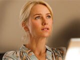 Naomi Watts says her family life is "not all a bed of roses"