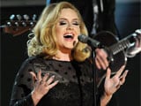 Adele enjoys private double date with Robbie Williams
