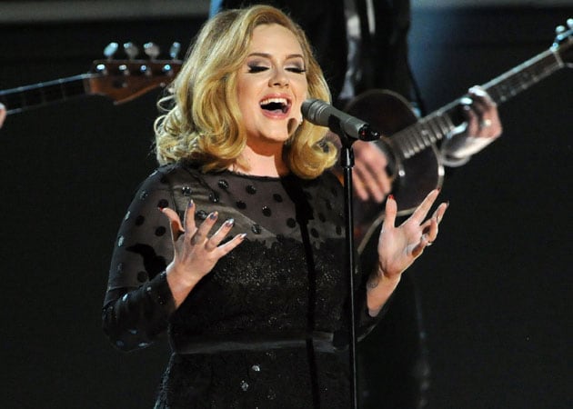 Adele enjoys private double date with Robbie Williams