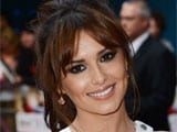Cheryl Cole shows off new back tattoo