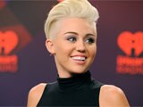 All well, wedding ring being fixed: Miley Cyrus