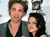 Robert Pattinson and Kristen Stewart celebrate with Katy Perry