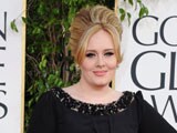 Adele feels "too young" for an autobiography