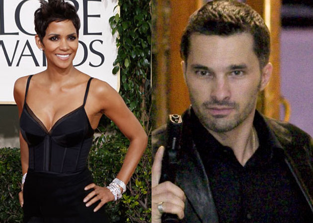 Halle Berry restrains fiance Olivier Martinez from fight with photographer