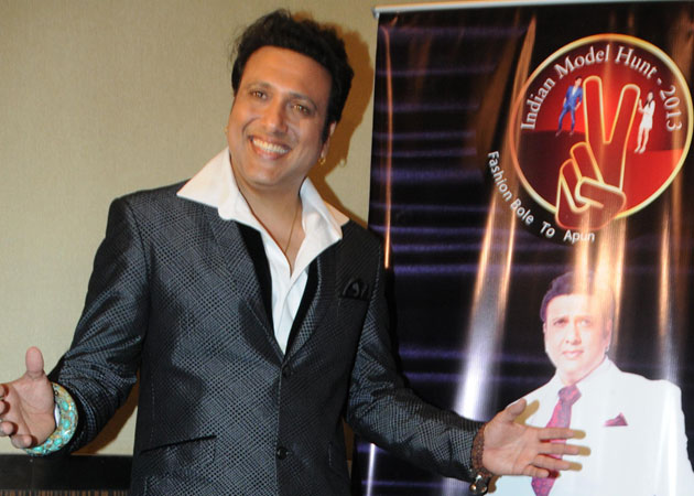Govinda gifts Hindi dictionary to Ashley Lobo