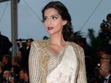 Cannes 2013: Sonam Kapoor stuns in vintage-look <I>sari</i> and jacket