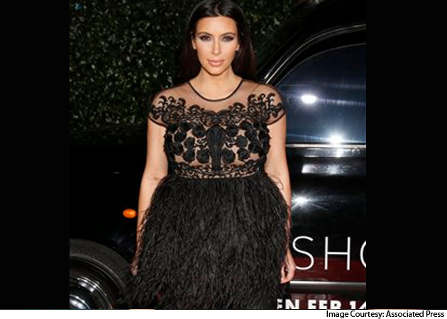 Pregnant Kim Kardashian threatened by paparazzi