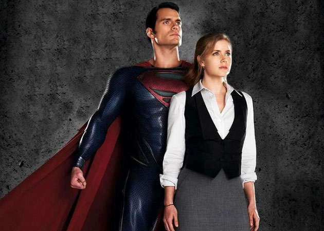 Not Superman, but his costume fascinates Amy Adam's daughter