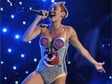 Miley Cyrus follows up risque show with raunchy tweets