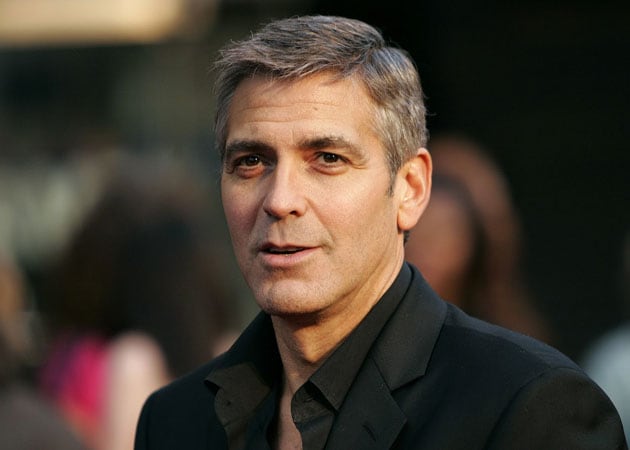 George Clooney works hard to stay in shape  