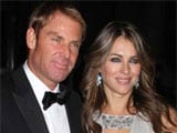Liz Hurley reunites with Shane Warne for family lunch