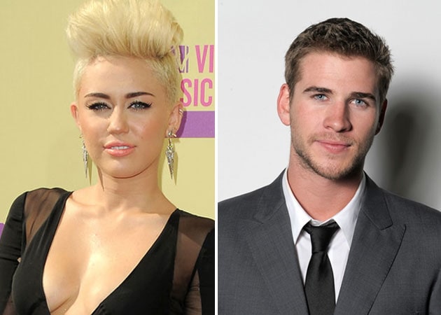Miley Cyrus, Liam Hemsworth put wedding on hold