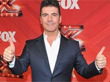 Simon Cowell describes seeing baby scan as "surreal"