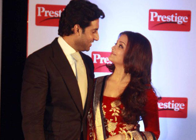 Abhishek Bachchan: I am used to people whistling at Aishwarya 