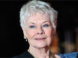 Judi Dench walks down red carpet just weeks after surgery