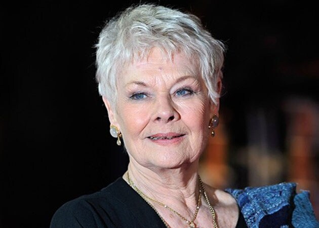 Judi Dench walks down red carpet just weeks after surgery