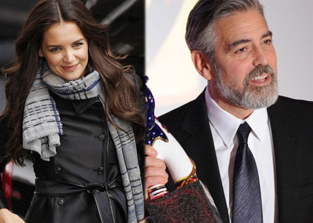 Katie Holmes bonds with George Clooney