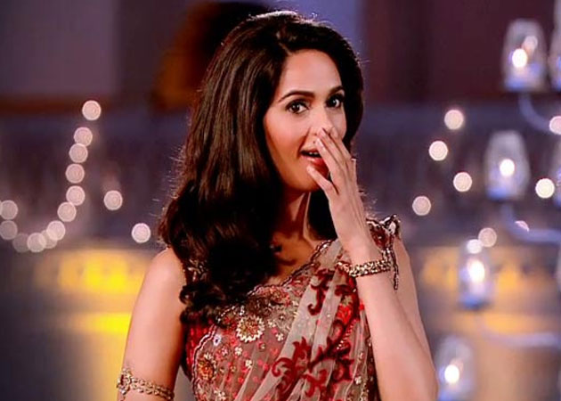 Mallika Sherawat kisses her suitor on <i>The Bachelorette India</i>