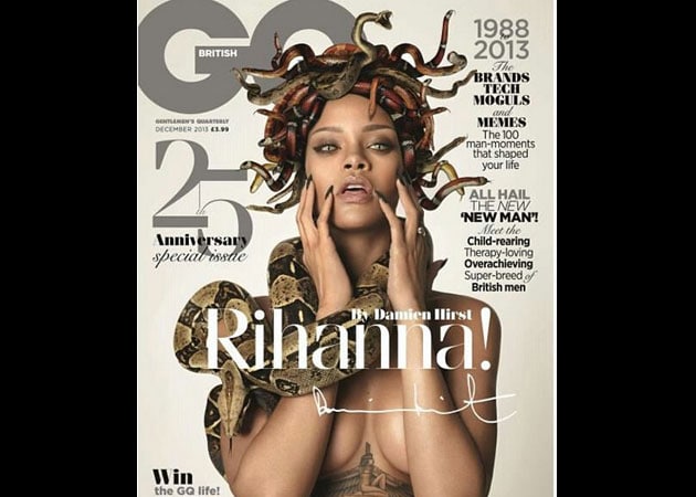 Rihanna poses naked with snakes for magazine cover