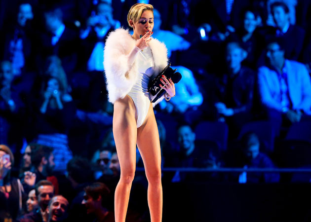 Miley Cyrus lights up a joint and Amsterdam at MTV awards